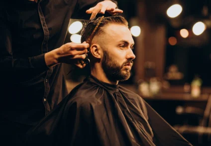 young-man-barbershop-trimming-hair-scaled