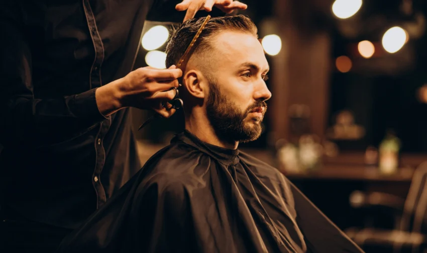 young-man-barbershop-trimming-hair-scaled young-man-barbershop-trimming-hair-scaled